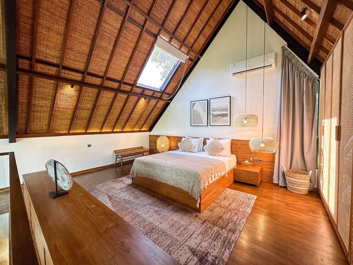 Loft bedroom under the woven roof
