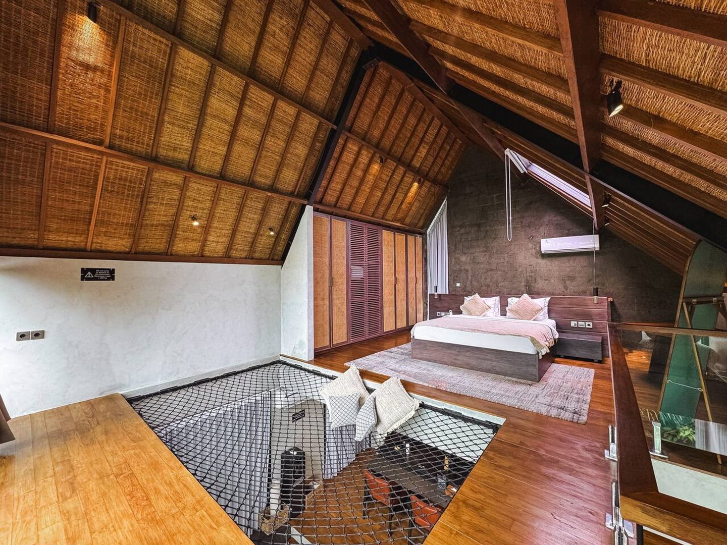 Mezzanine bedroom open to the living room below